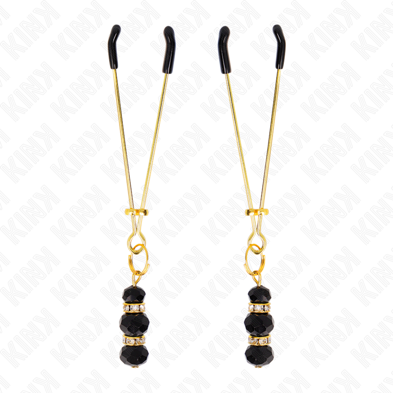 KINK – Pincette à tétons dorées avec ornements bijoux noirs